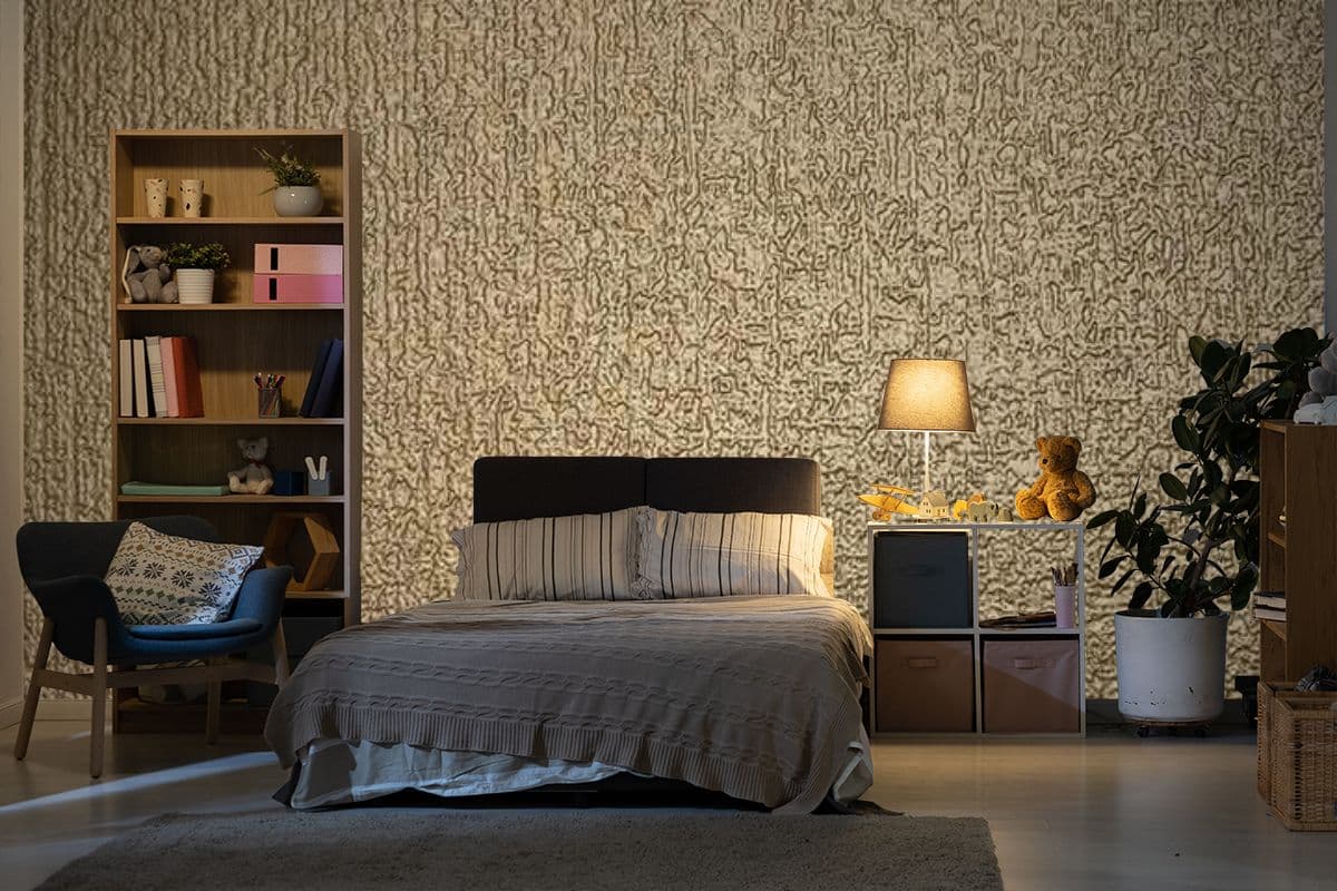 Golden Rough Textured Effect Wallpaper shown in a room