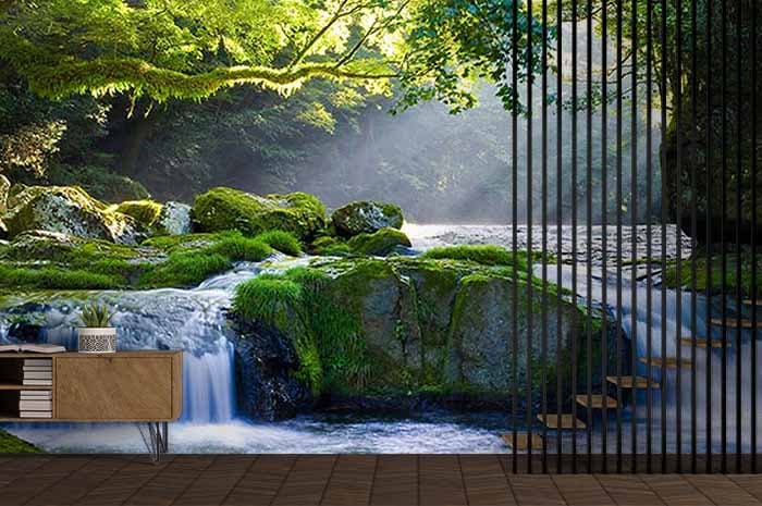 Green Rocks and Jungle River Wallpaper shown in a room