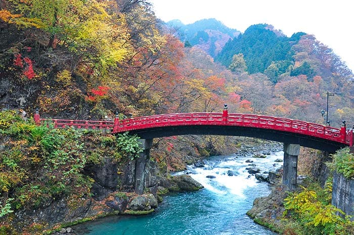 Red Bridge Over a Beautiful River Wallpaper pattern detail
