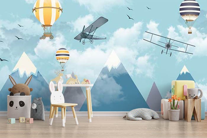 Snowy Mountain, Aircrafts and Balloons Kids Wallpaper shown in a room