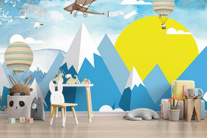 Mountain With Hot Air Balloon and Aircraft Kids Wallpaper shown in a room