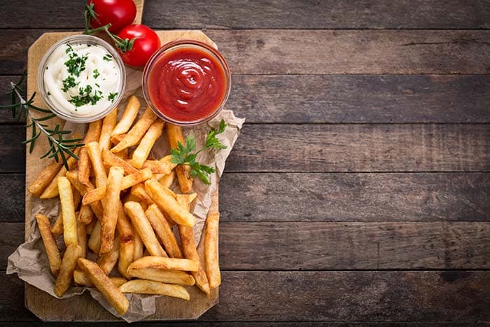 French fries and wooden table pattern detail