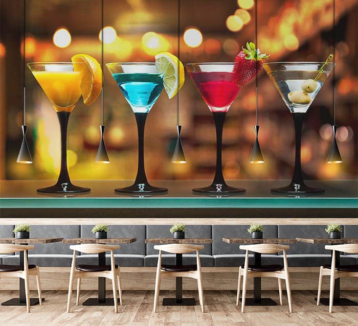 cocktails on bar glass shelves shown in a room