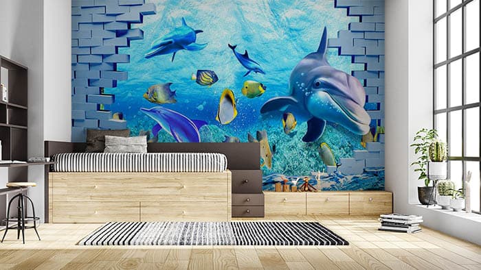 3D Dolphins and Fishes Wallpaper shown in a room