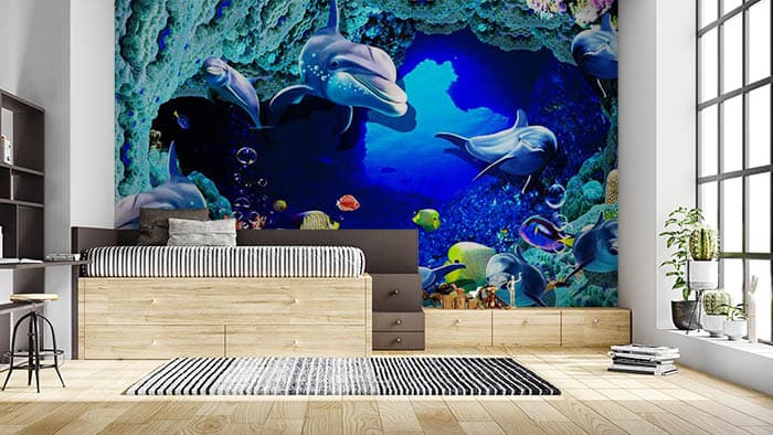 Animated Dolphins Underwater Ocean Wall Mural Wallpaper shown in a room