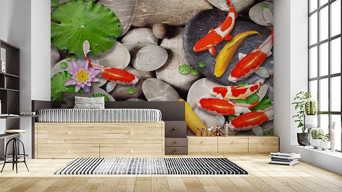 Colorful Orange and Yellow Tropical Fish Art Wallpaper shown in a room