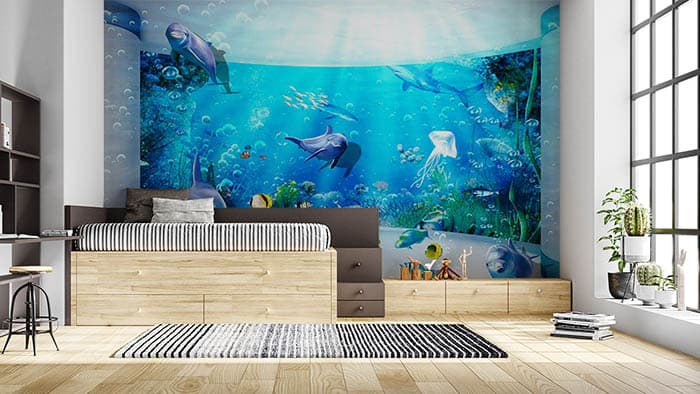 Stylish Dolphins Underwater Scene Wallpaper shown in a room