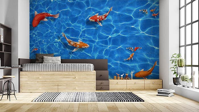 Tangerine Fishes Vibrant Ocean Life Wallpaper shown in a room