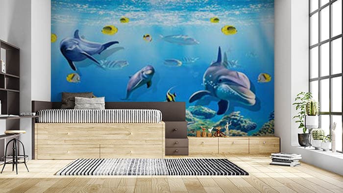 Yellow Fishes and Dolphins Wallpaper Mural shown in a room