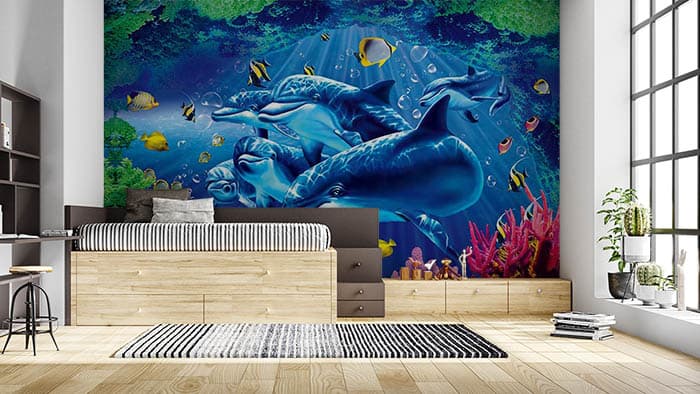 Playful Dolphins Ocean Adventure Wall Mural Wallpaper shown in a room