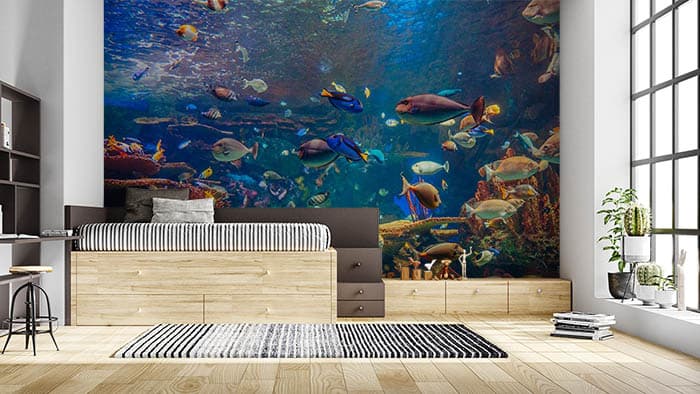 Tropical Blue Fish Ocean Wall Wallpaper shown in a room