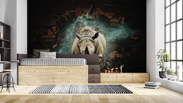 Poweful Rhinocerous shown in a room