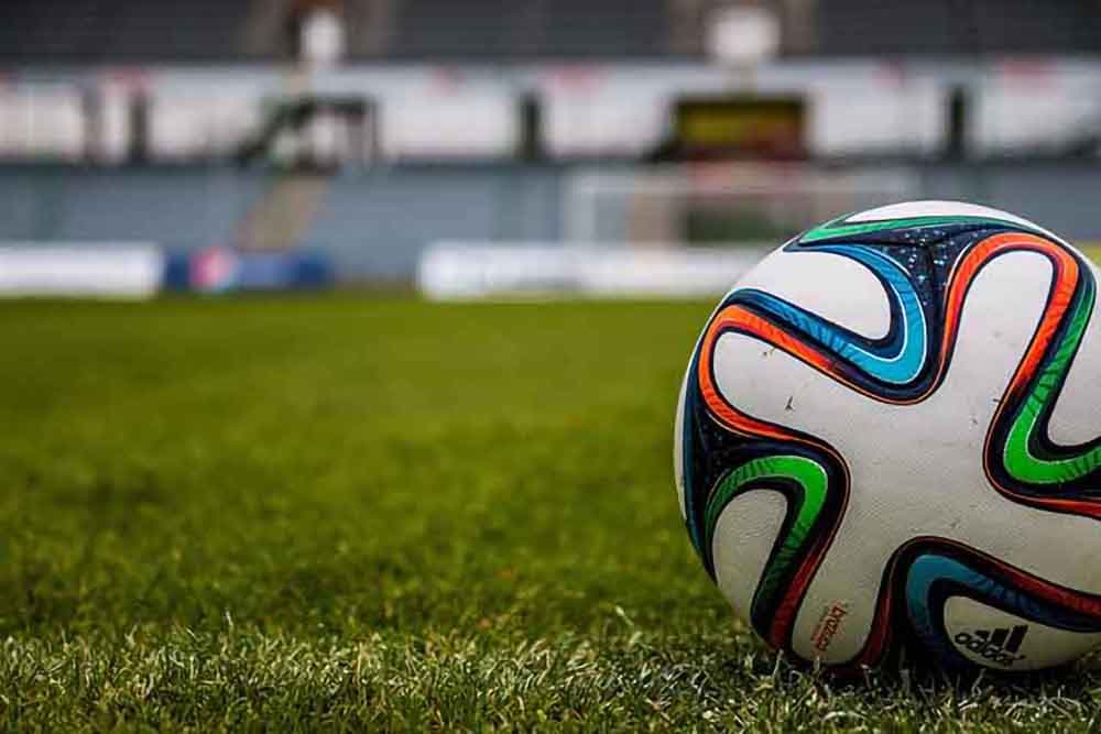 Energetic Football Stadium Wall Decor Wallpaper pattern detail