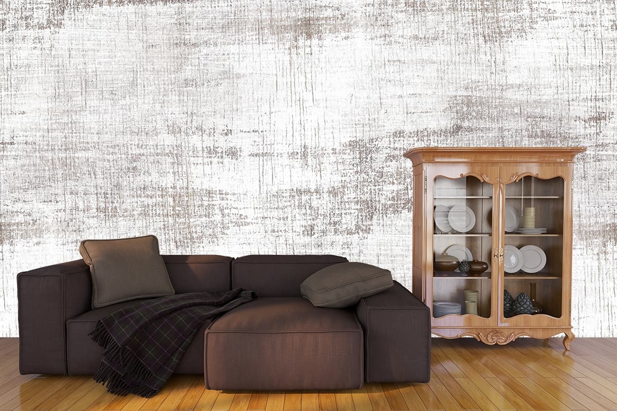 White Surface with Brown Spots Abstract Texture Wallpaper shown in a room