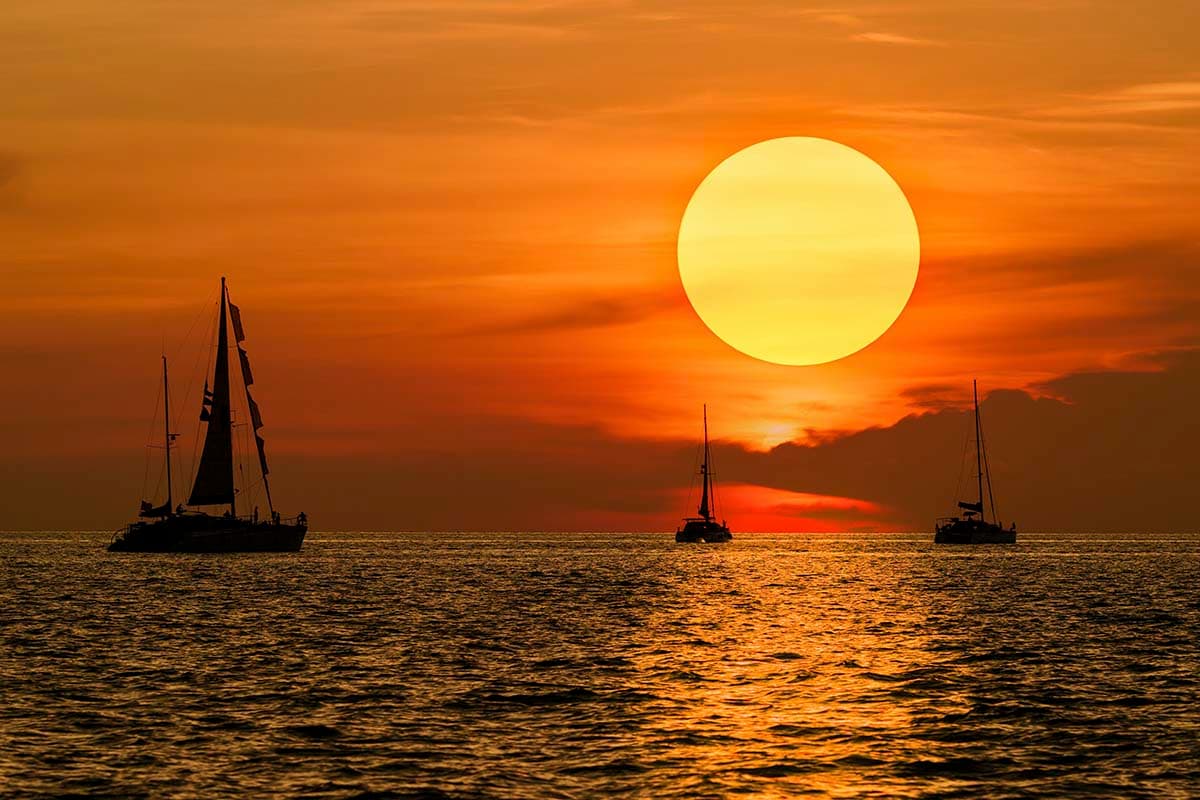 Golden Sunset Sailboats Scenic Ocean View Wallpaper pattern detail