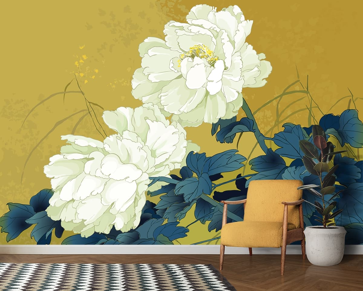 A white flowers on a plant shown in a room