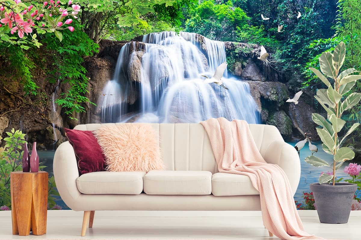 Birds resting by peaceful pond with flowing falls wallpaper shown in a room
