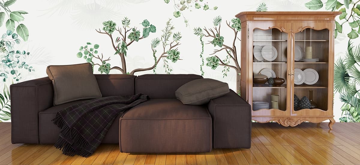 A wallpaper with trees and plants shown in a room