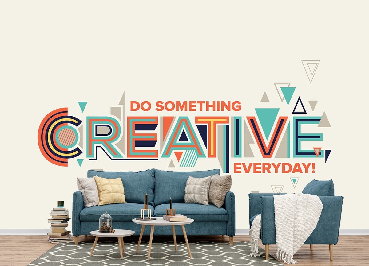 A colorful text on a white background shown in a room