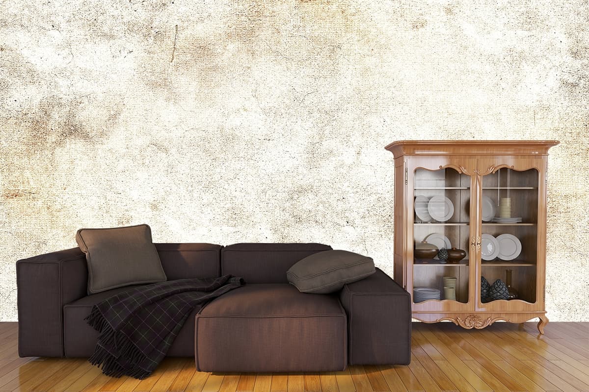 Elegant White Surface with Brown Spots Wallpaper shown in a room