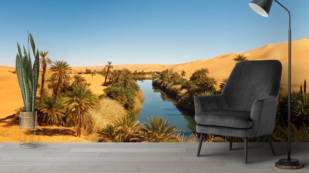 Premium Desert River Scene with Palm Trees Wallpaper shown in a room