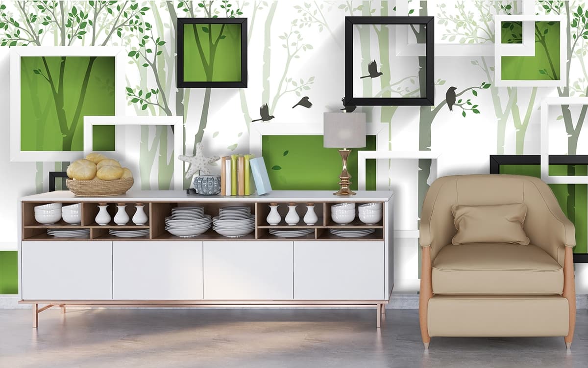 A wall with black frames and birds on it shown in a room