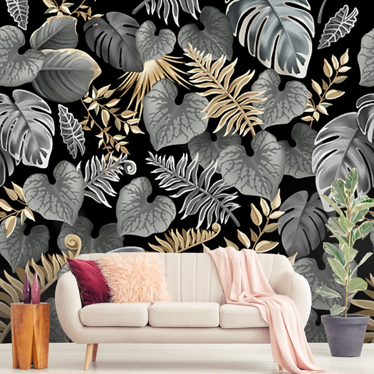 A pattern of leaves on a black background shown in a room