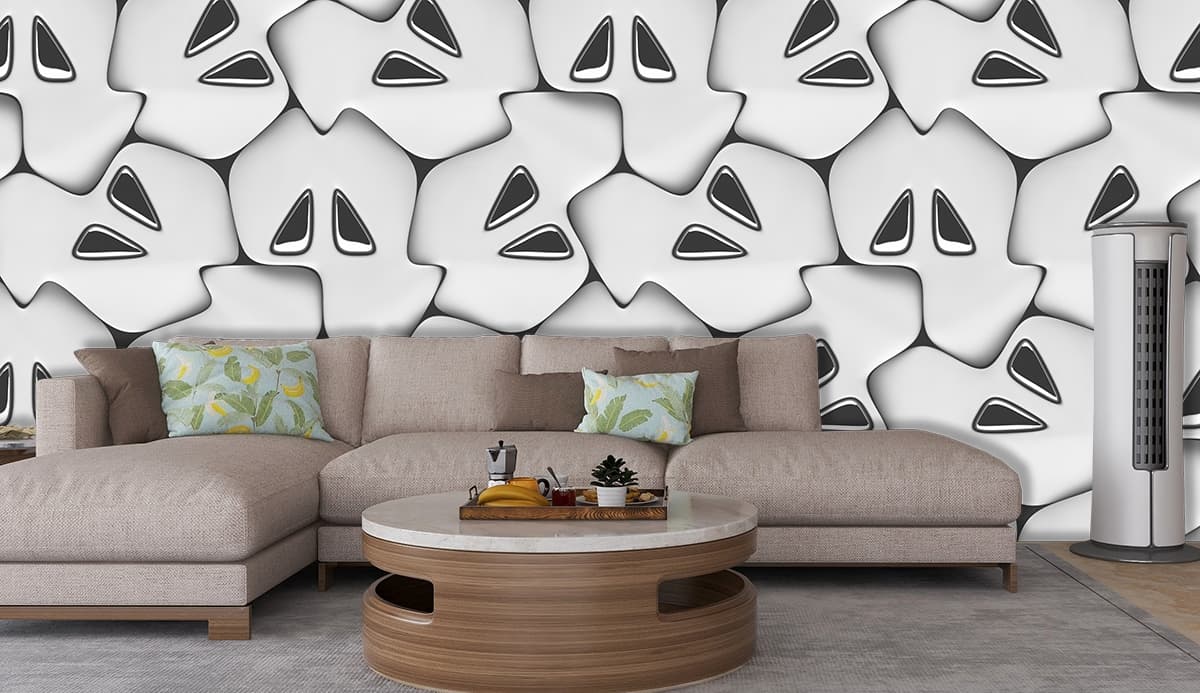 A group of white shapes with black eyes shown in a room