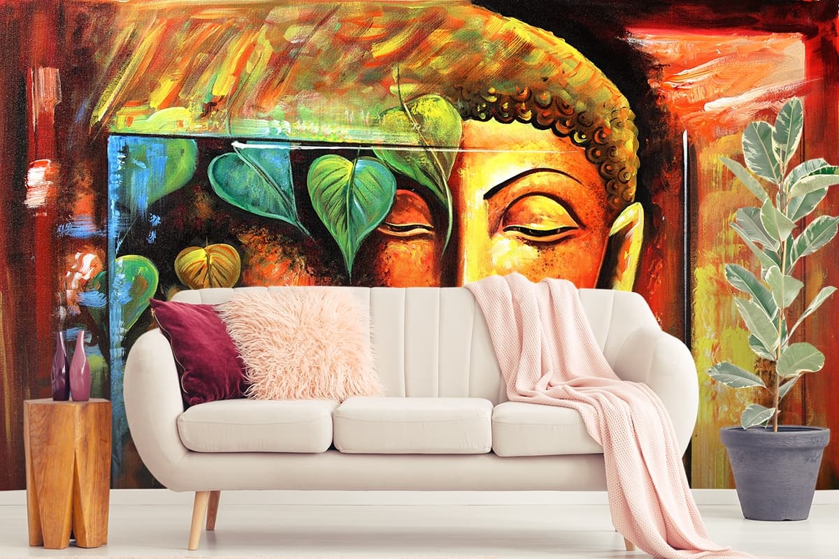 A painting of a face and leaves shown in a room