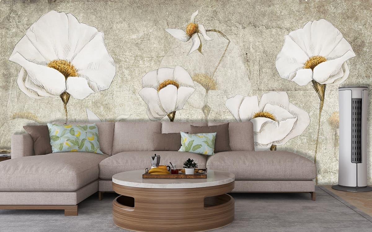 A group of white flowers shown in a room