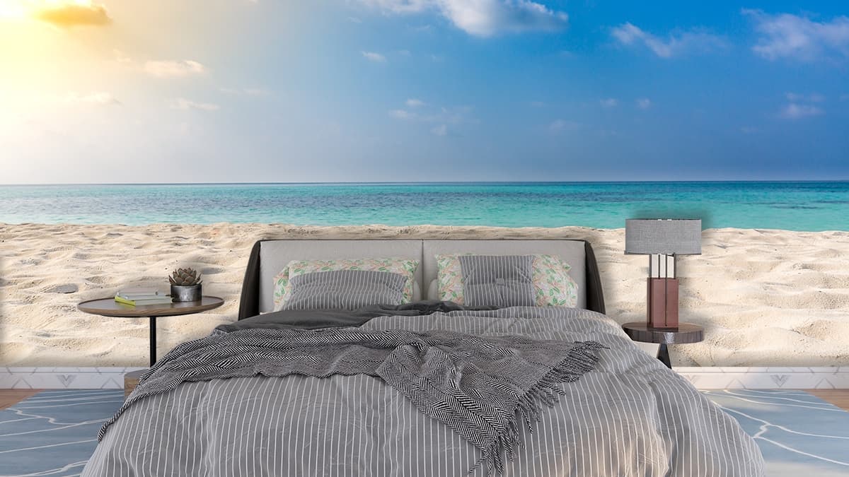 Sandy Beach with Blue Water and Sky Wall Mural Wallpaper shown in a room