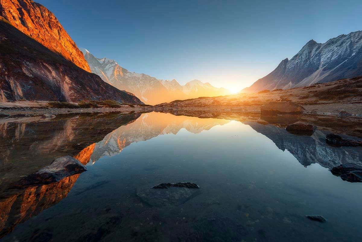 Serene Sunrise With Mountains and Lakes Wallpaper pattern detail