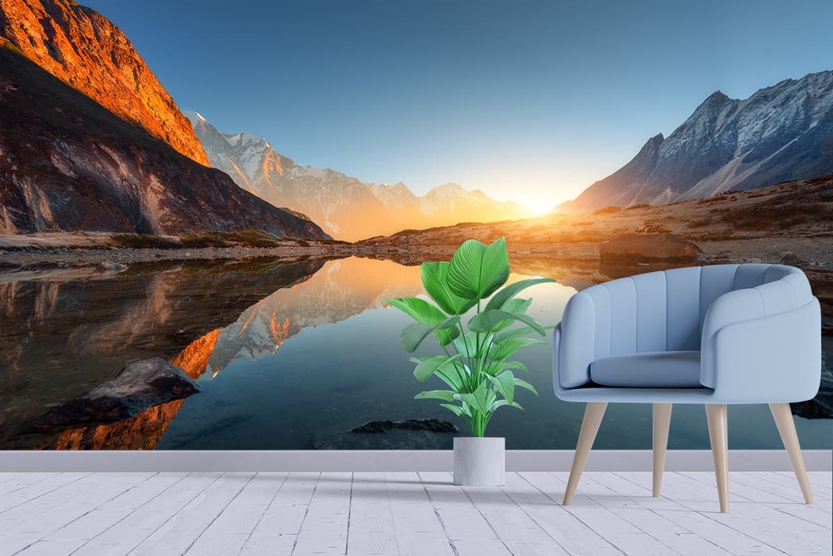 Serene Sunrise With Mountains and Lakes Wallpaper shown in a room