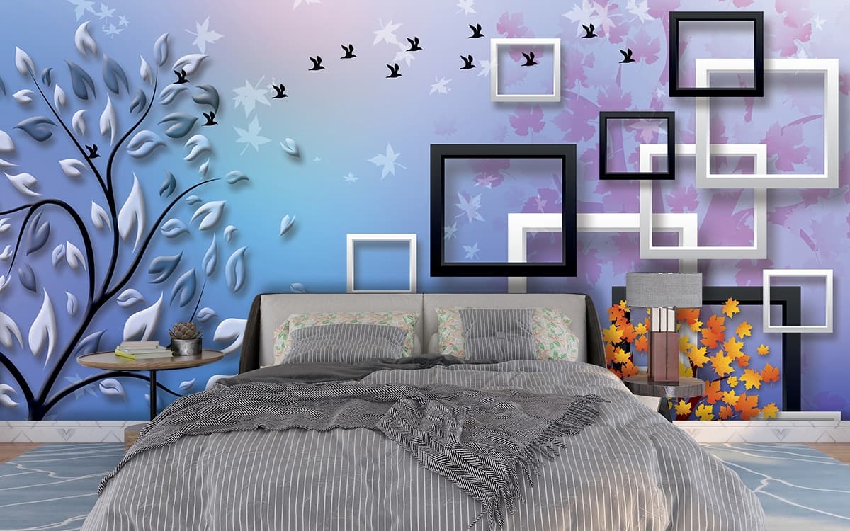 A tree with leaves and birds flying shown in a room