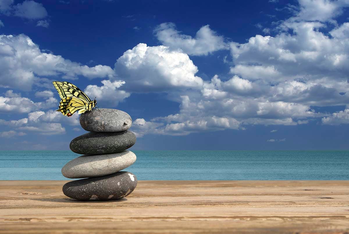 Peaceful Beach Stacked Rocks and Sky Blue Wallpaper pattern detail