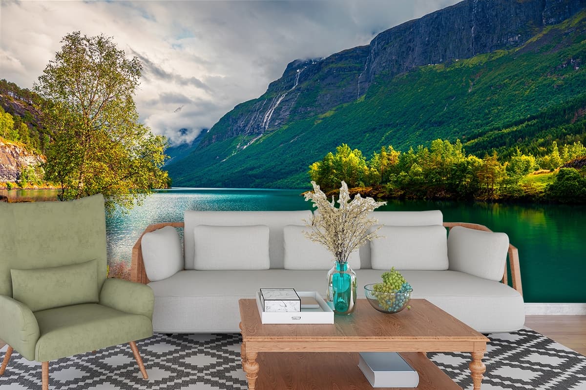 A boat on the shore of a lake shown in a room