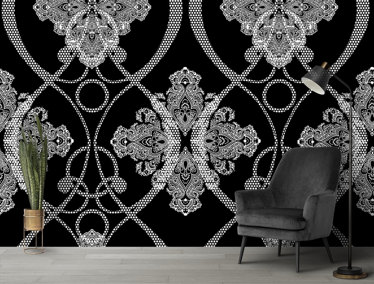 Ornate black white pattern with vintage royal feel wallpaper shown in a room