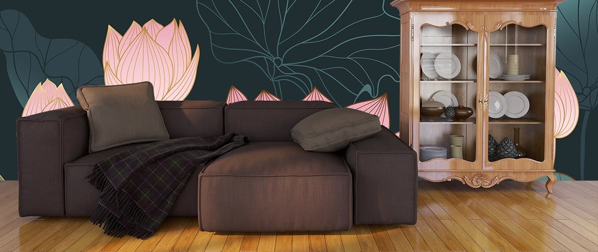 A pink and gold flower shown in a room