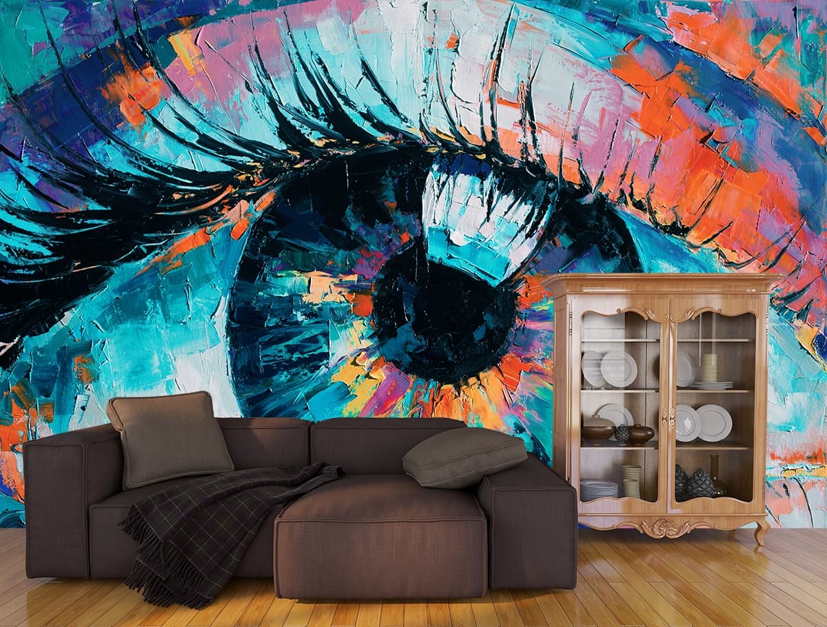 A painting of an eye shown in a room