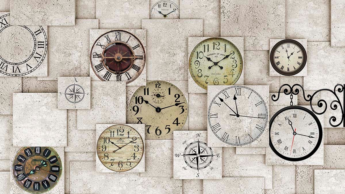 A group of clocks on a wall pattern detail