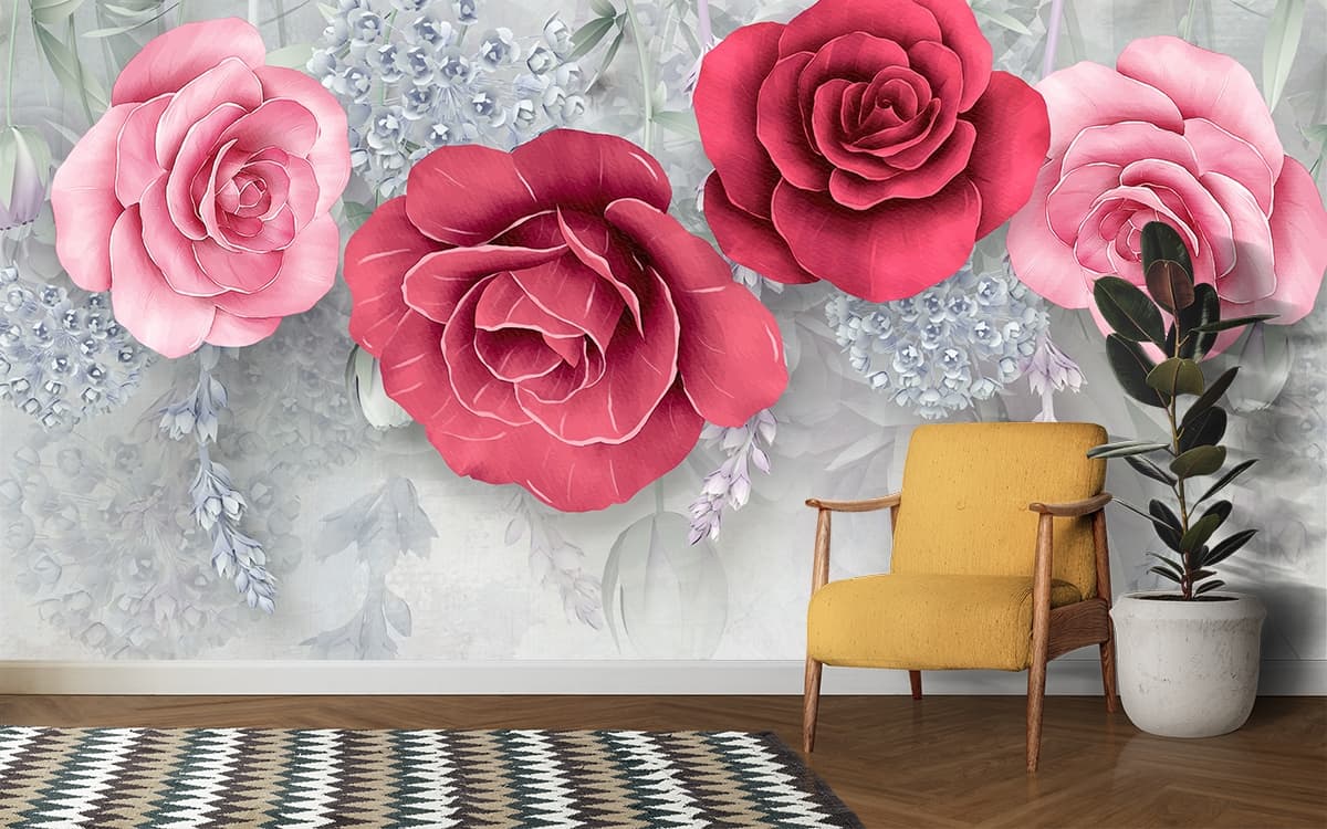 A group of flowers on a white background shown in a room