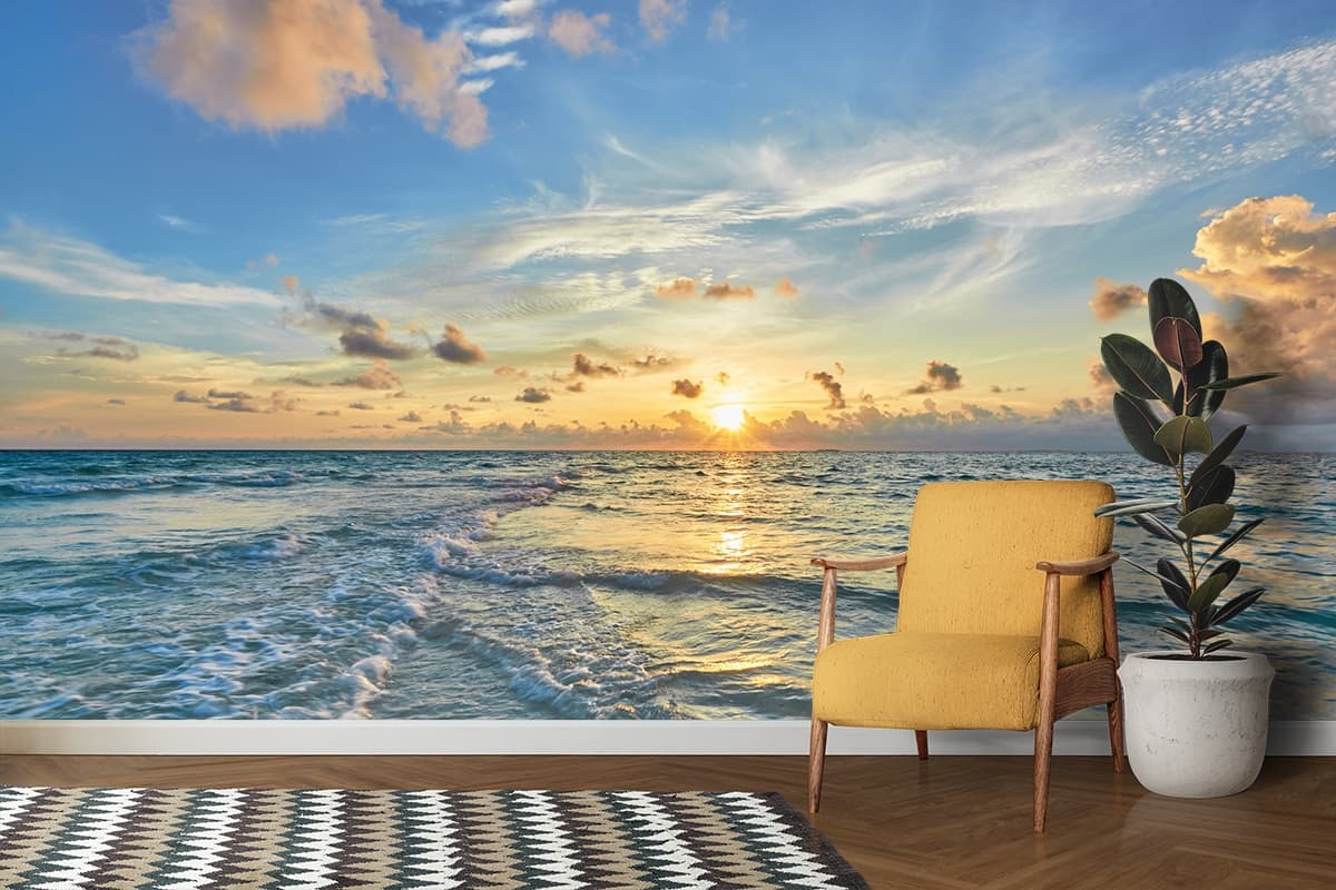 Vibrant Sunset Over the Ocean Waves wallpaper shown in a room