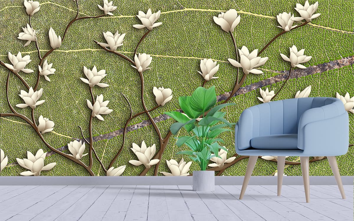 A white flowers on a green surface shown in a room