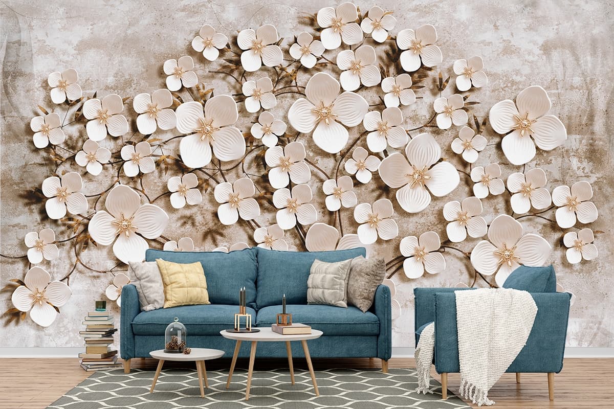A tree of flowers on a wall shown in a room