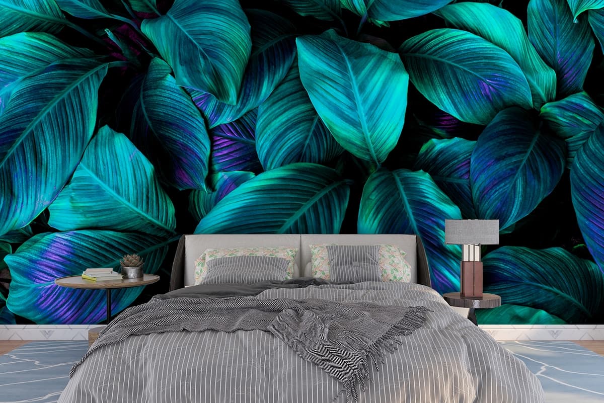 A group of blue and green leaves shown in a room