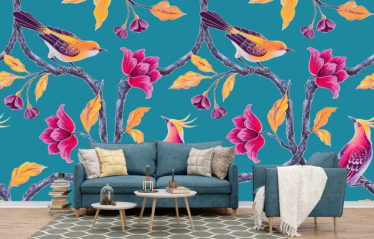 A colorful bird on a tree branch shown in a room