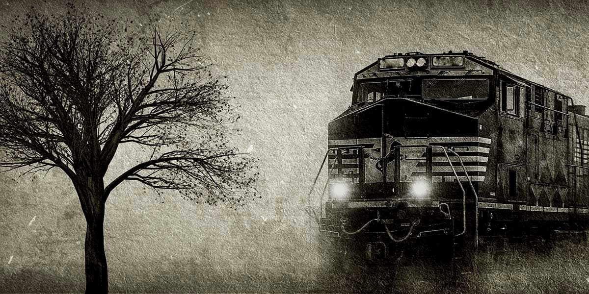 A train with headlights on pattern detail