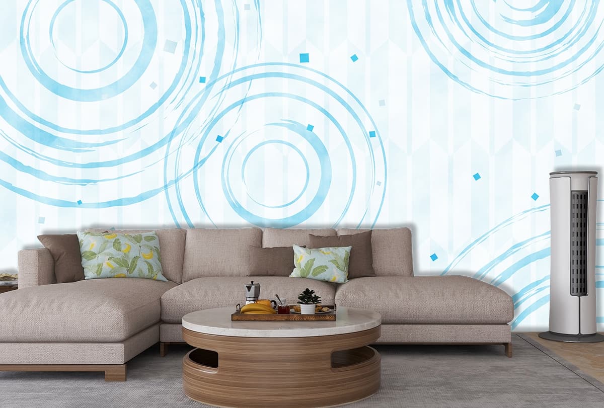 A blue circles and dots on a white background shown in a room