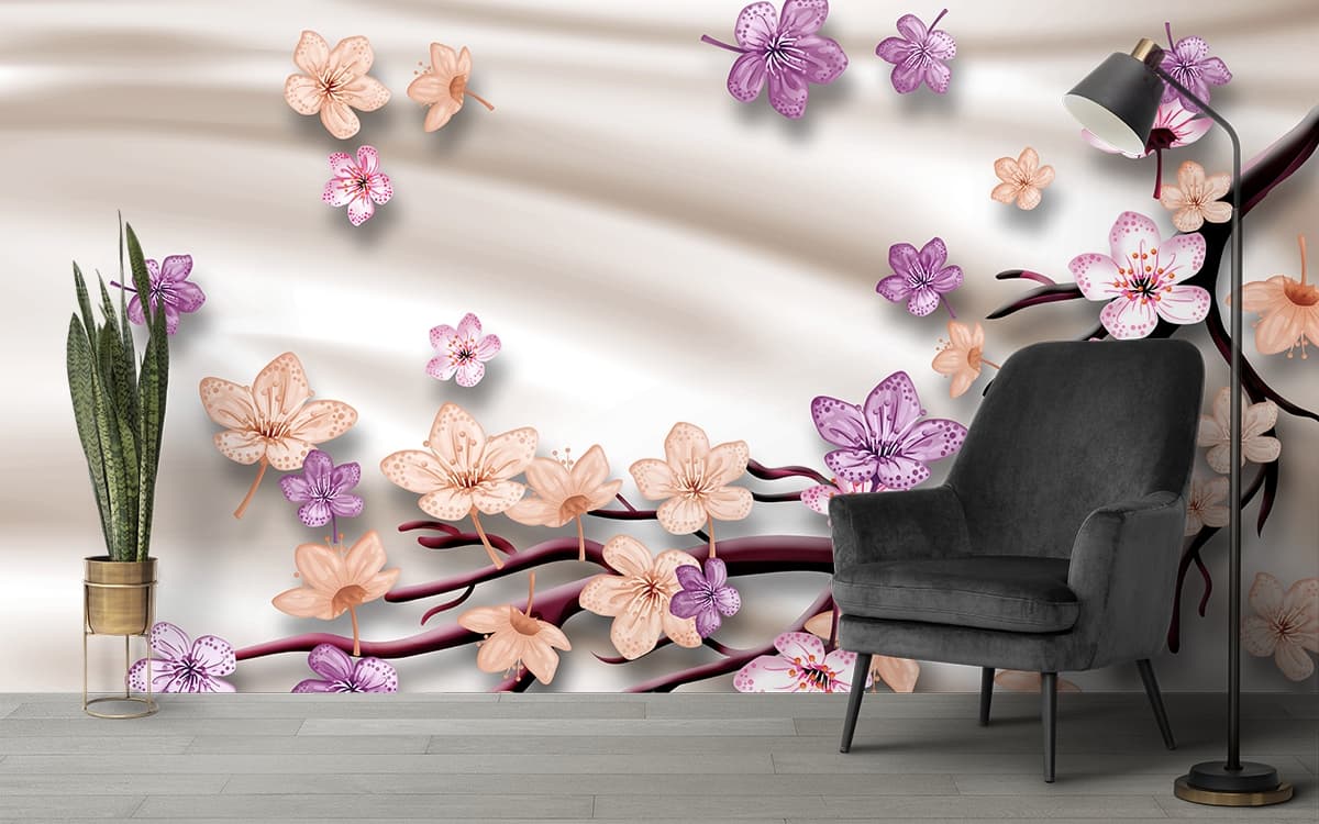 A branch with flowers on it shown in a room