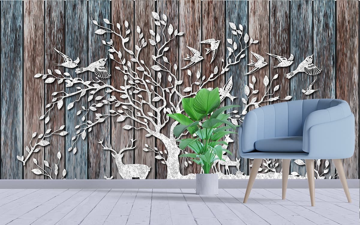 A tree with birds and animals on it shown in a room